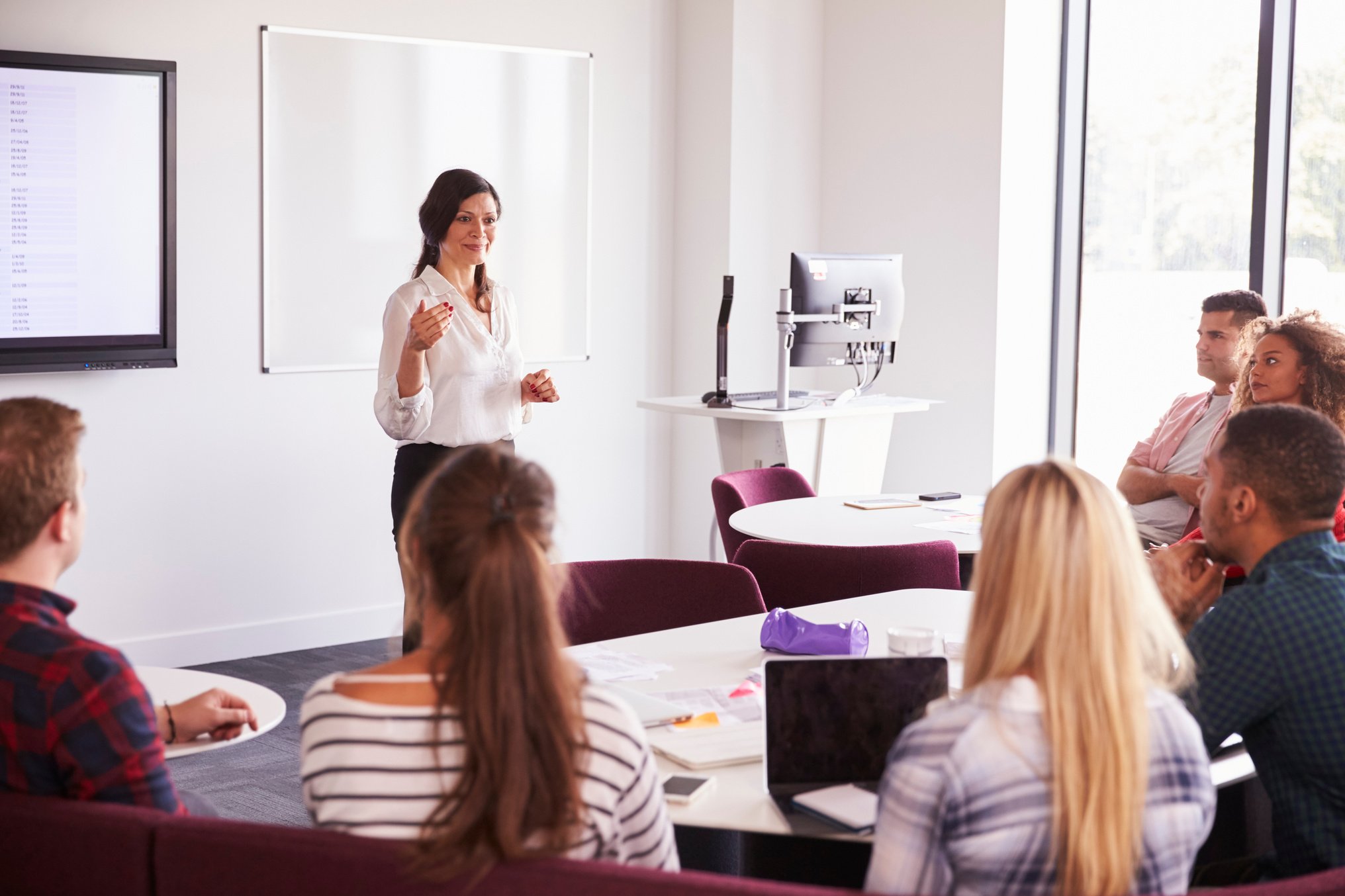 University Students Attending Lecture on Campus