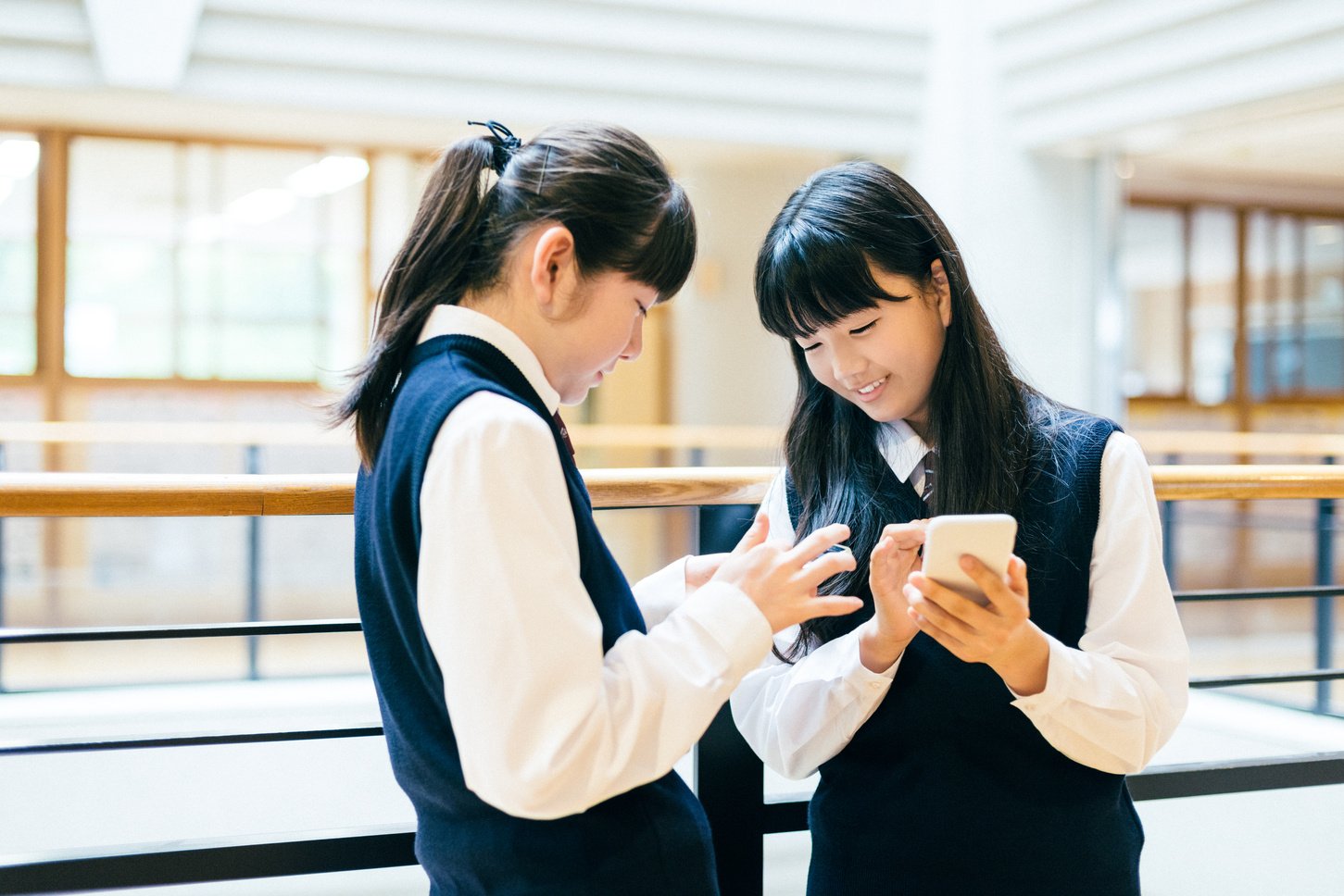 Japanese High School Girl Students using Smartphones at school