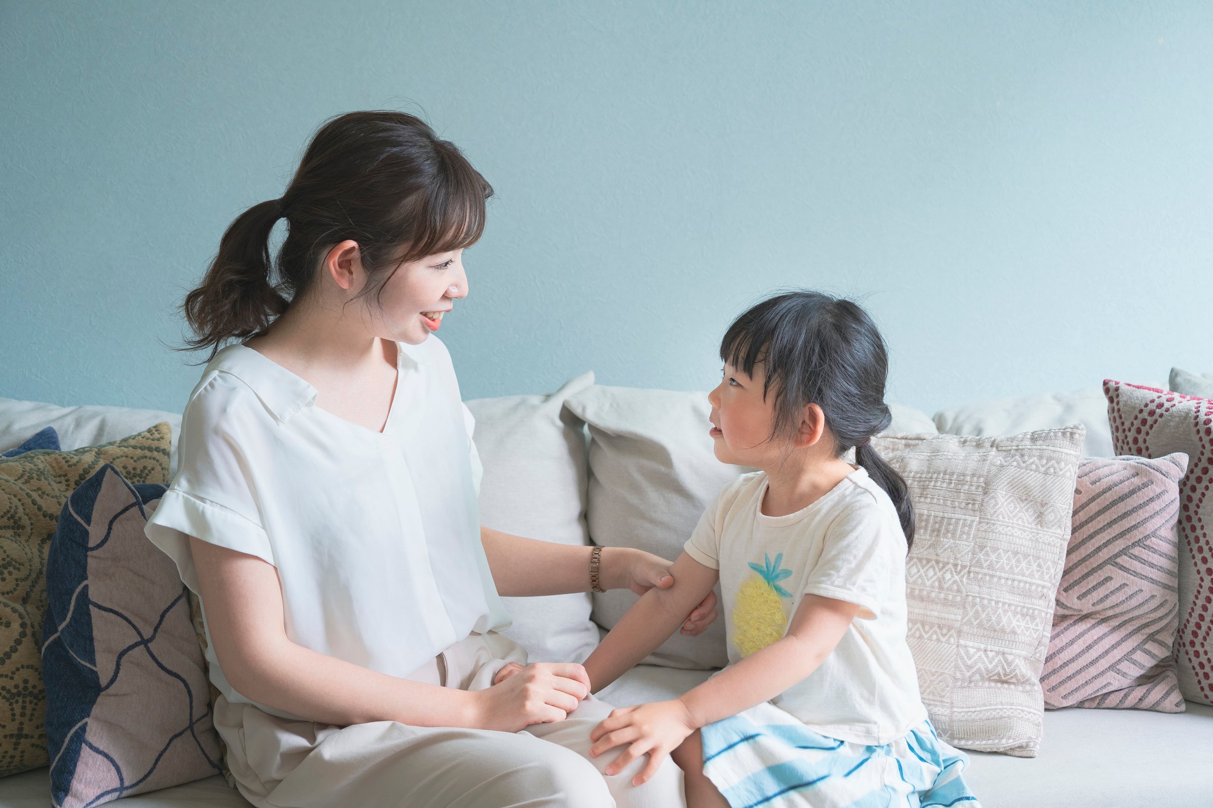 Parent and child on the sofa